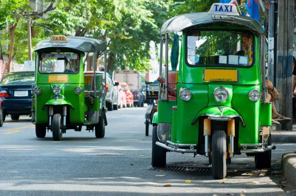 Tuk tuk taxis on the street in Bangkok, Thailand