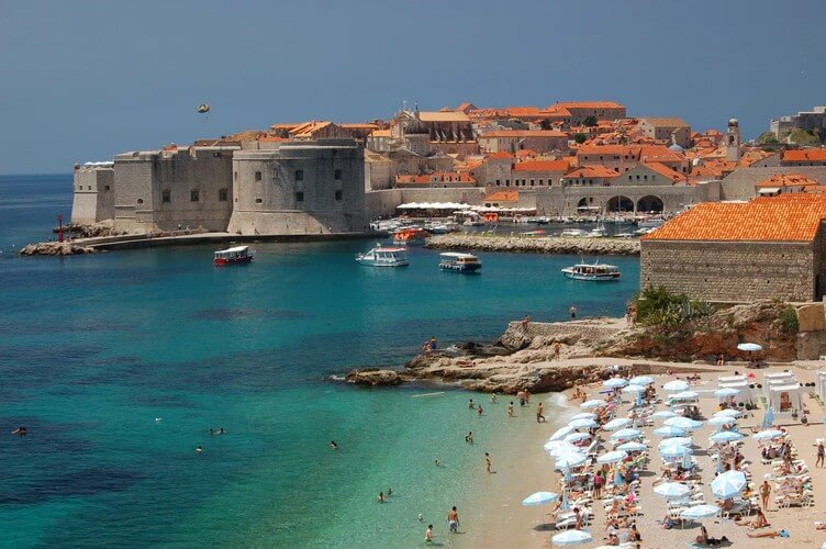 Beach, castle and the city of Dubrovnik