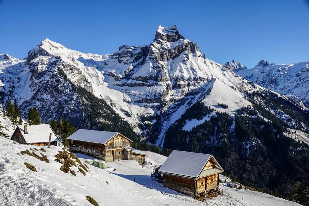 Small village in the snowy mountains in Europe