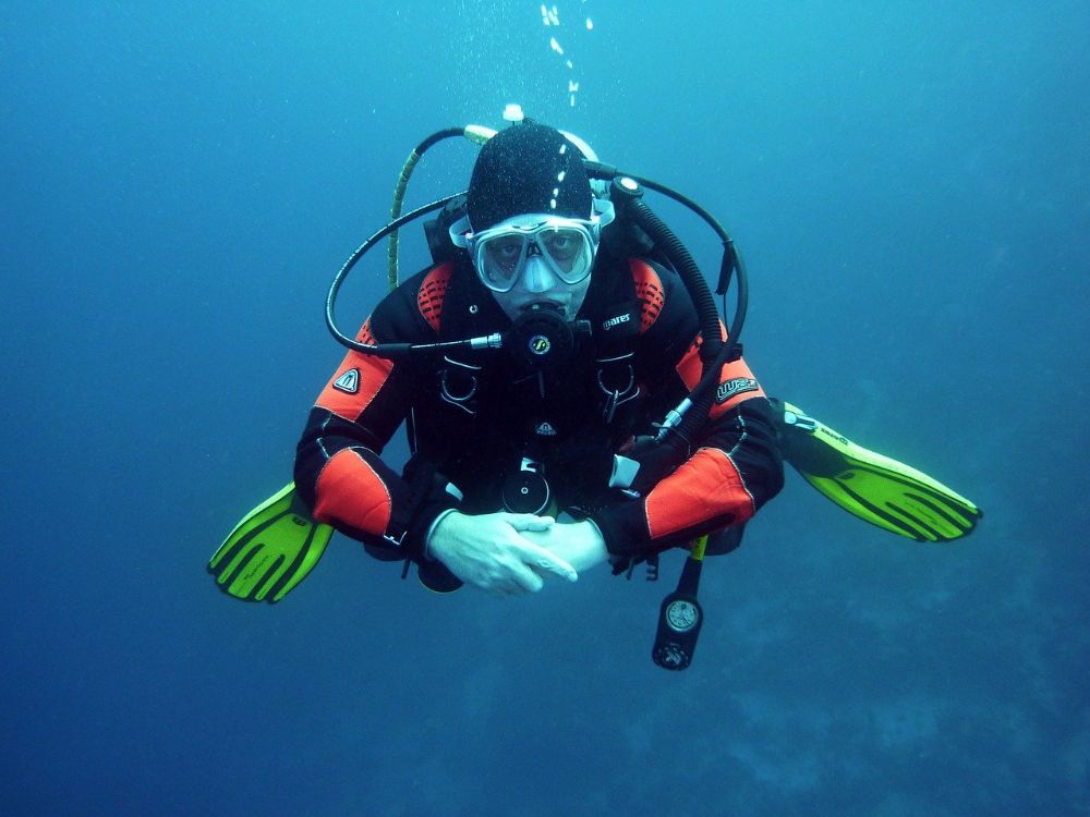 Diver swimming underwater in Bahrain