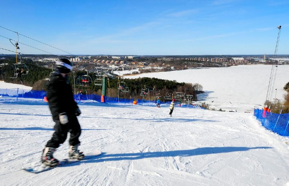 Flottsbro ski slope snowboarding down the hill Huddinge Sweden