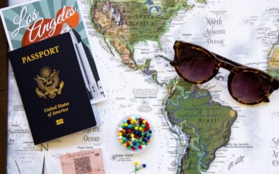 Travel map and documents, glasses, trip planning and budgeting